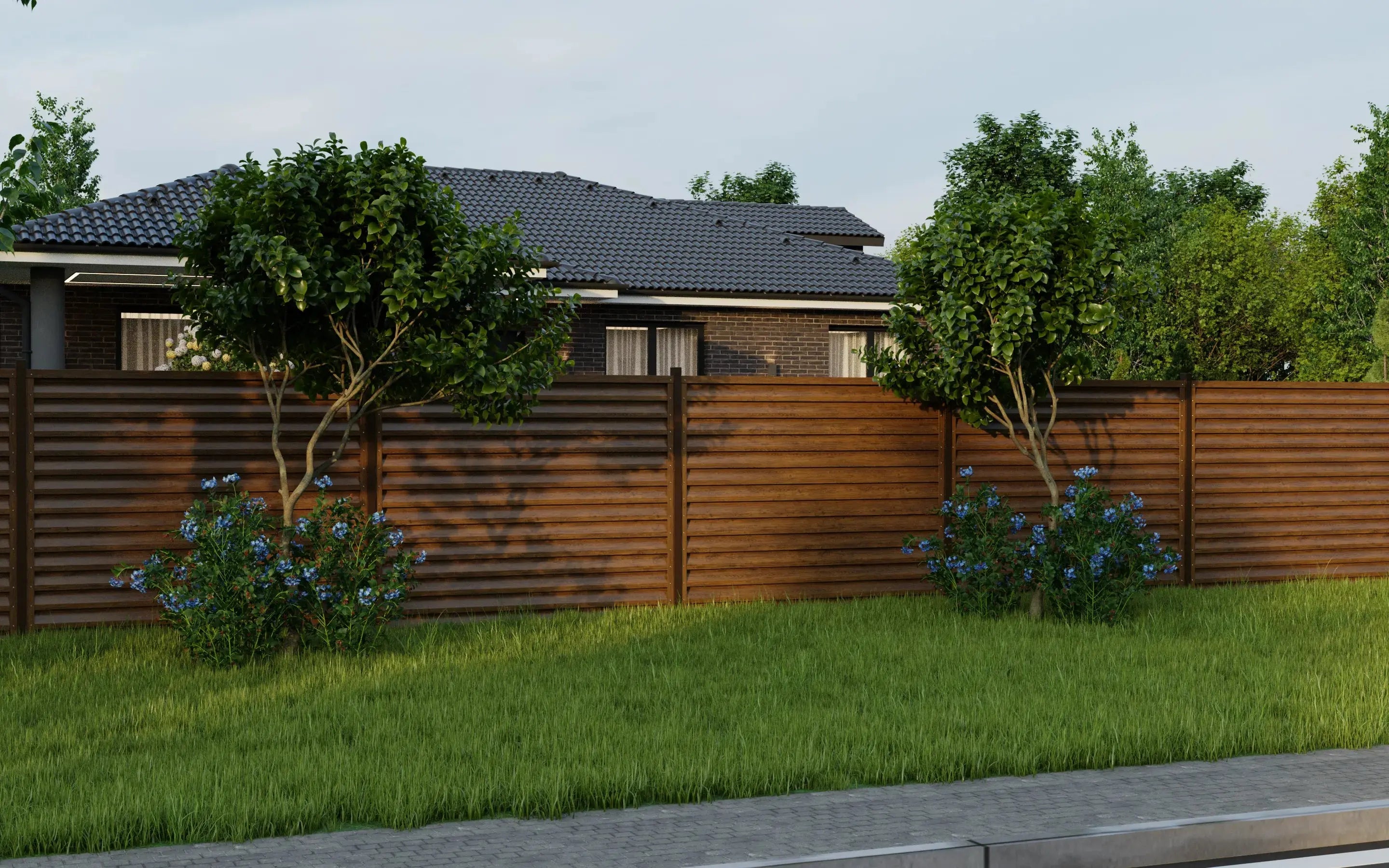 House with a wooden fence and greenery